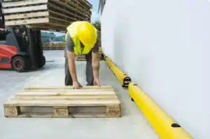 Worker in a hard hat and hi-vis vest